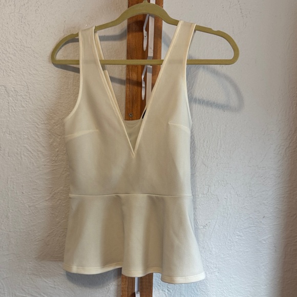 Express size small Cream Sleeveless Peplum Top - Picture 1 of 3